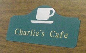 Wall sign with raised lettering